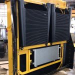 Reconditioned CAT 777 radiator and cooler module on shop floor at St. Louis repair facility