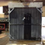 Large gray industrial radiator undergoing service at St. Louis radiator repair facility